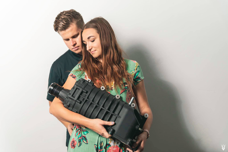 Illustration for article titled Couple Takes Baby Pictures with Supercharger After Mom Pressures Them for Grandchildren